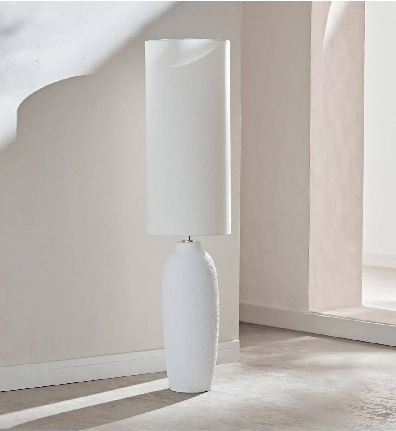 White ceramic floor lamp.